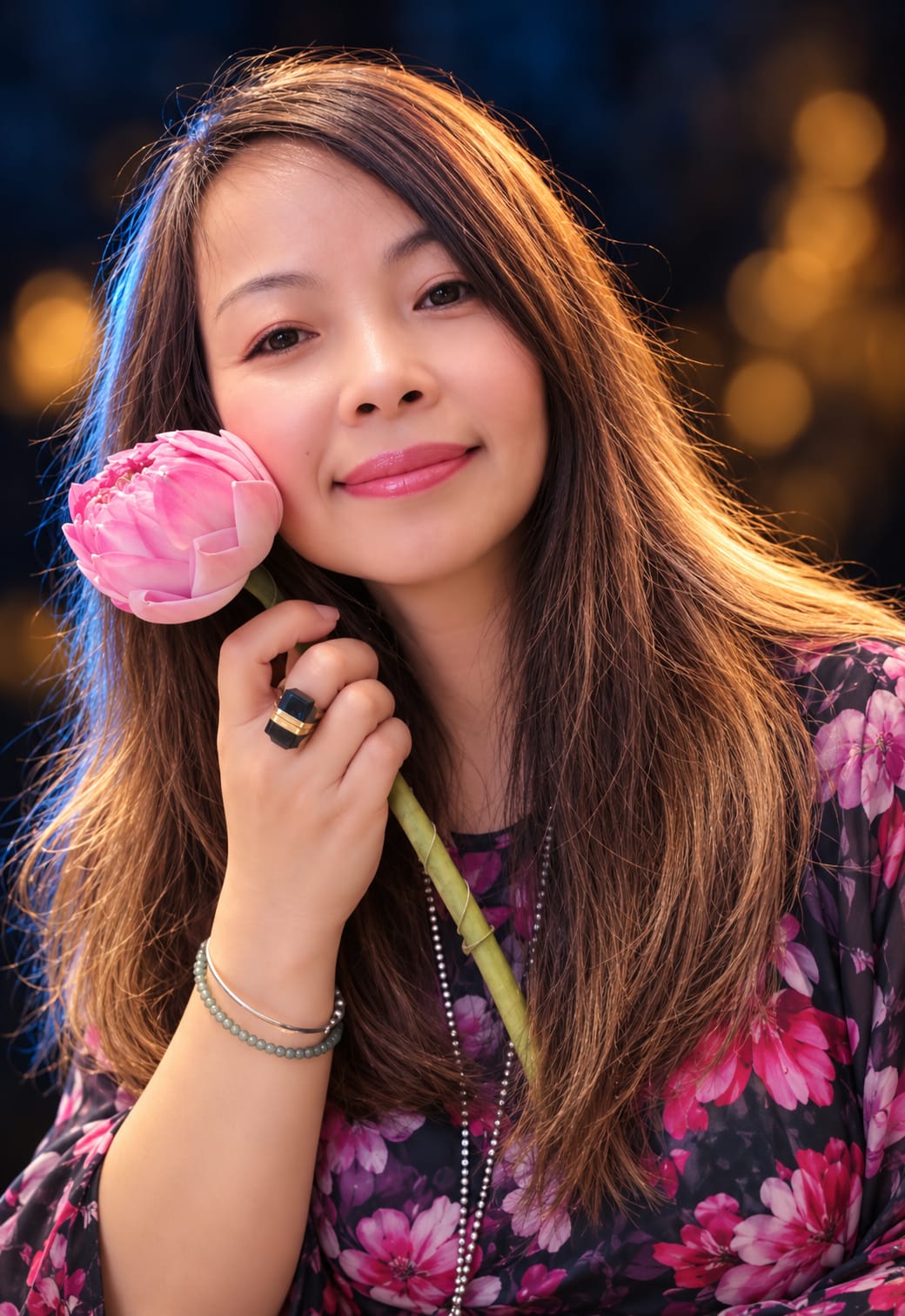 Portrait of Vietnamese poet Võ Thị Như Mai holding a pink lotus flower